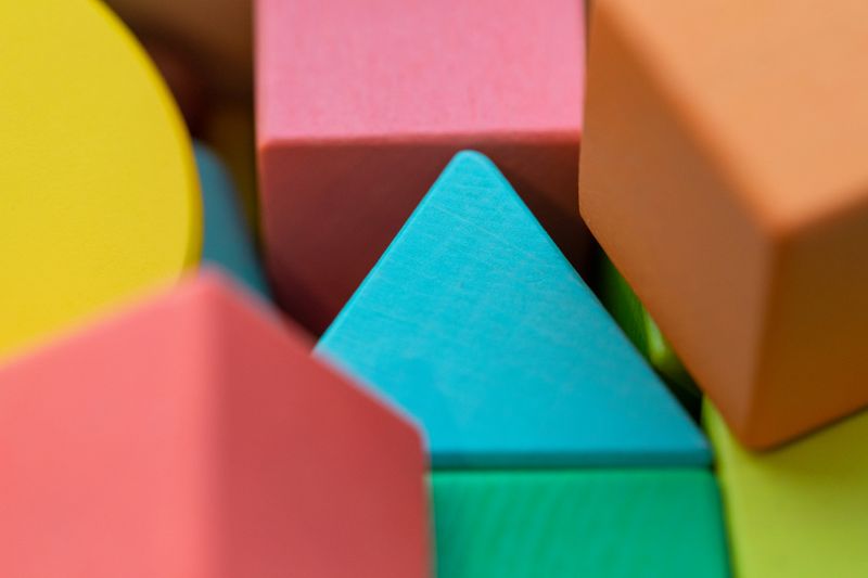 Brightly coloured wooden building blocks